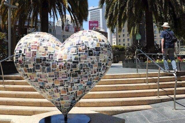 Heart Sculpture in the foreground of Union Square in San Francisco