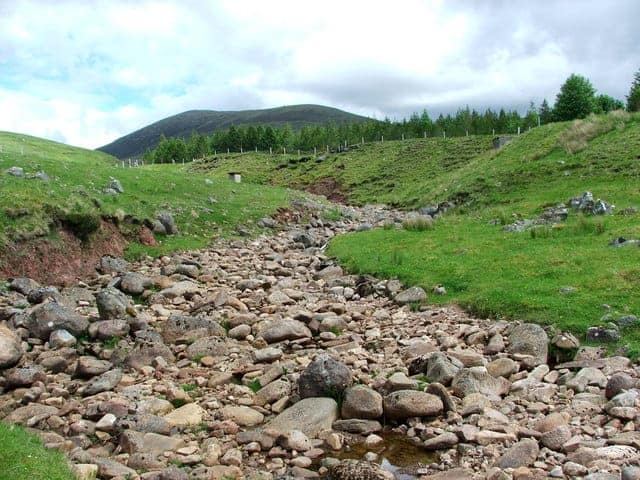Dry river bed. The old river bed of the Allt a`Choire-rainich. The stream is now diverted 100m further up. Photo: David Maclennan.