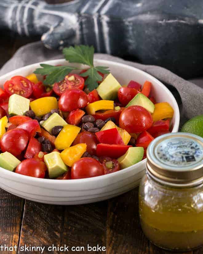 Chunky Guacamole Salad - all the fabulous flavors of guacamole in a refreshing avocado salad dressed with a lime vinaigrette.! Avocado Salad with a jar of lime vinaigrette