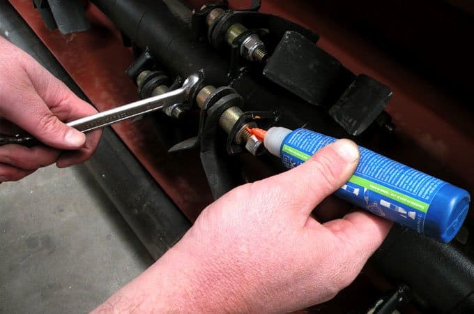 Lock-Tite seals bolts in place when tightening them.