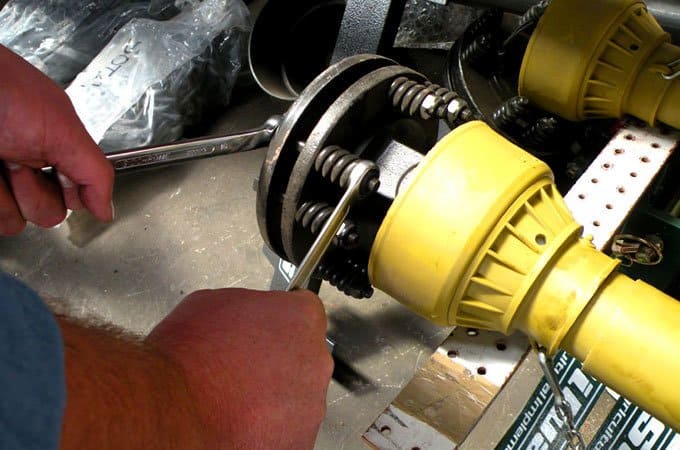Tightening nuts on a PTO shaft slip clutch.