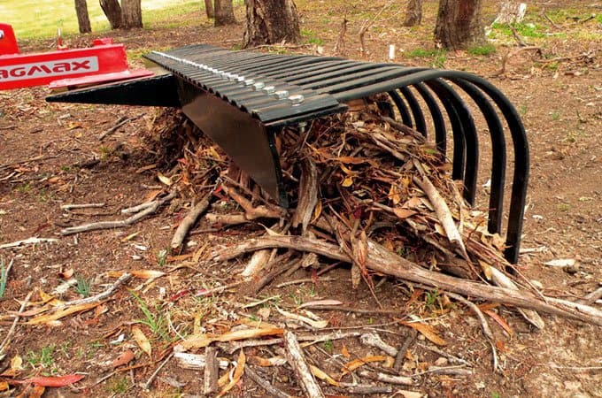 A Stick Rake can help remove bigger branches before slashing.