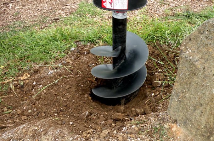 Great care should be taken to remain well clear of the auger when it is operating.