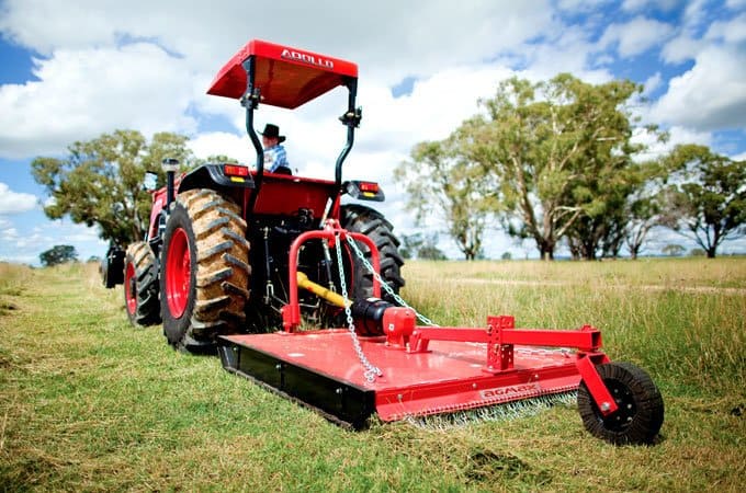 Slashing with an AGMAX slasher attached to an APOLLO tractor.
