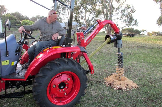 APOLLO 354 with AGMAX post hole digger.