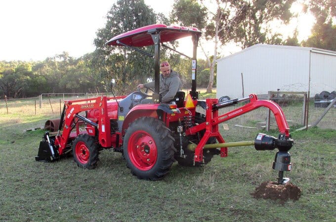 APOLLO 354 with AGMAX post hole digger.