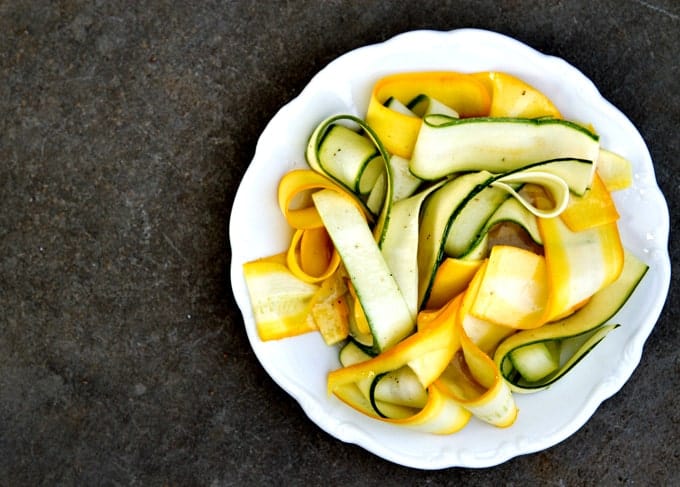 Zucchini Ribbons with Lemon & Black Pepper Vinaigrette zucchini ribbons take just minutes to make and you can toss with just about any dressing for a quick salad or side dish - plus they're so pretty!