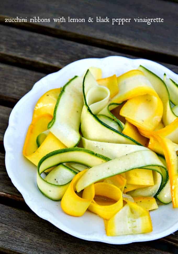 Zucchini Ribbons with Lemon & Black Pepper Vinaigrette zucchini ribbons take just minutes to make and you can toss with just about any dressing for a quick salad or side dish - plus they're so pretty!