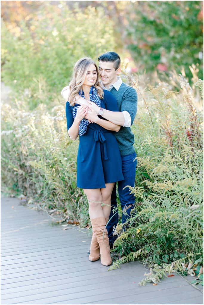 engagement session portrait of a couple hugging and laughing Chicago Lincoln Park