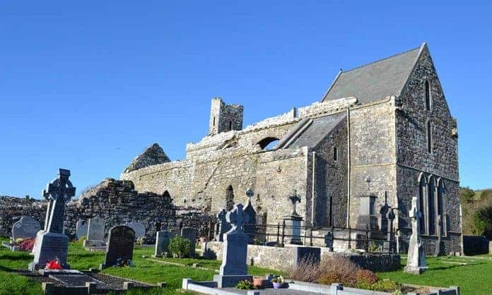 The ruins of Corcomroe Cistercian Abbey from a south-easterly direction. A view of Corcomroe Abbey from a south-easterly direction - The Irish Place