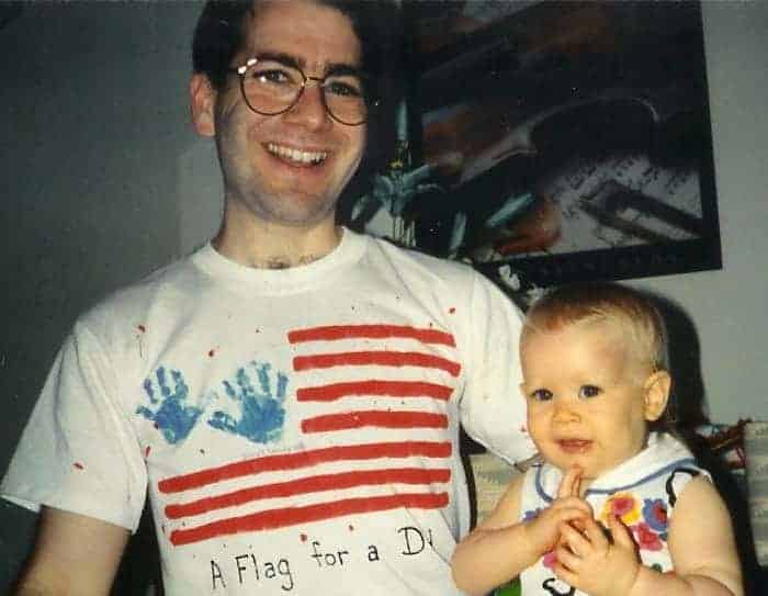 Author's husband and infant daughter wearing matching Father's Day Flag shirts