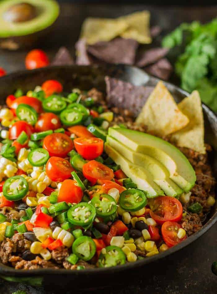 Healthy Nachos Healthy nachos in a cast iron skillet.