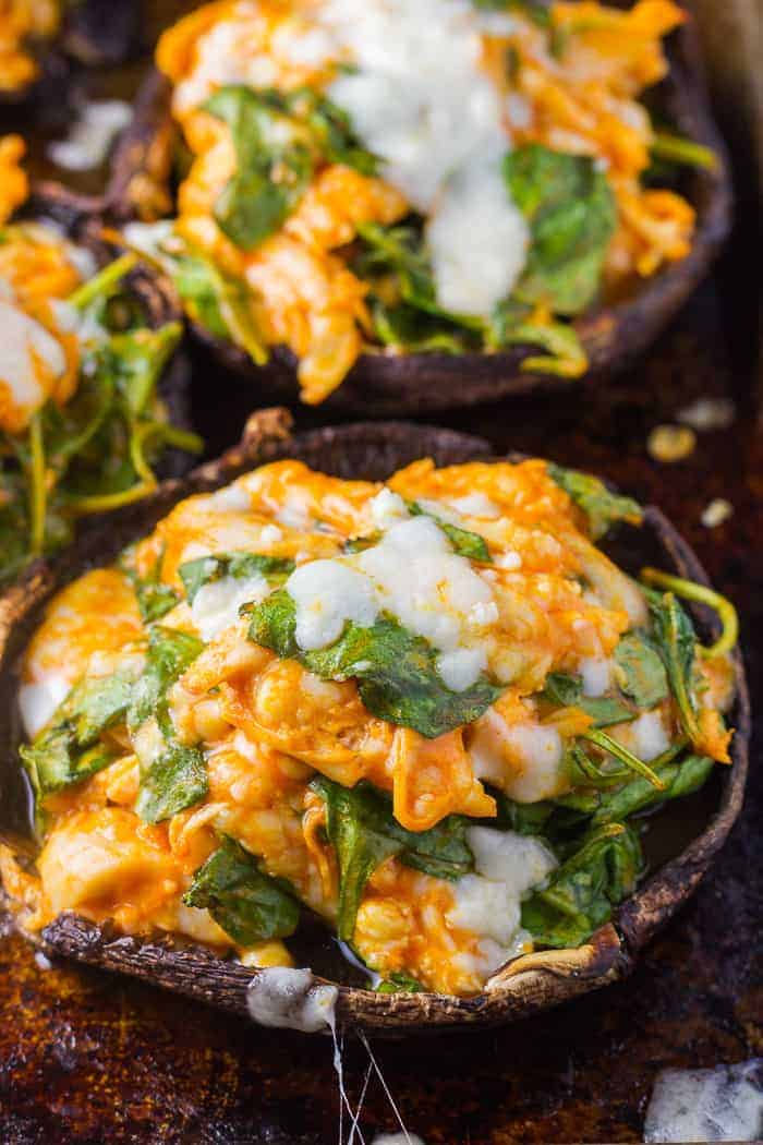 Keto Stuffed Portobello Mushrooms (Buffalo Chicken & Spinach) Keto Stuffed Portobello Mushrooms with shredded chicken, spinach, mozzarella and wing sauce.