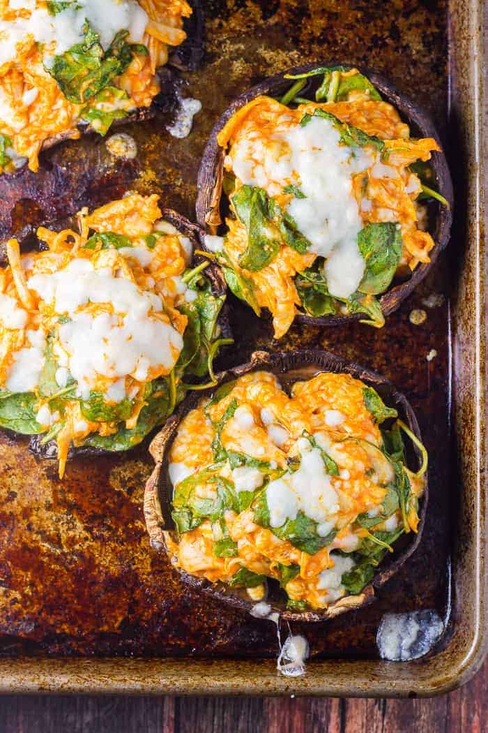 Keto Stuffed Portobello Mushrooms (Buffalo Chicken & Spinach) Keto Stuffed Portobello Mushrooms with shredded chicken, spinach, mozzarella and wing sauce.