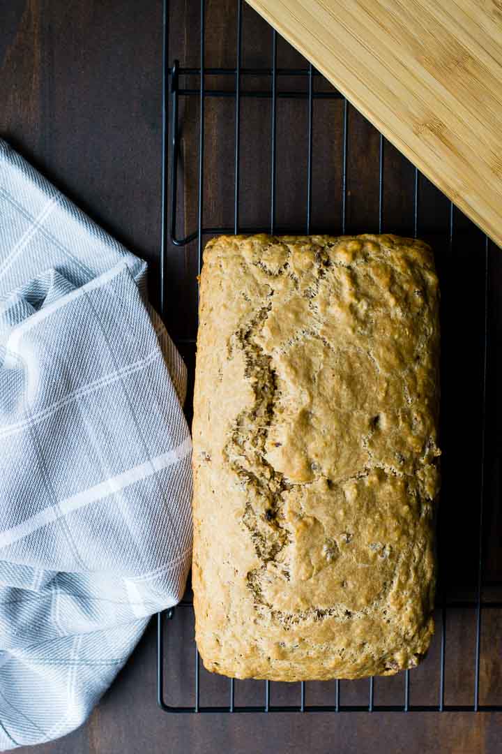 An overhead shot of a loaf of cheddar sausage Guinness beer bread.