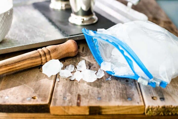 Crushed ice in a double lined plastic bag.