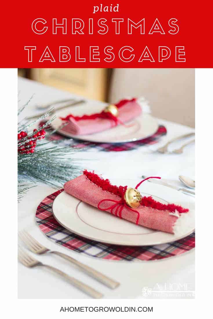 This simple and elegant Christmas tablescape has lots of fun ideas like DIY red and white plaid placemats, fringed napkins, and a beautiful snowy centerpiece. #christmastablescape #christmas