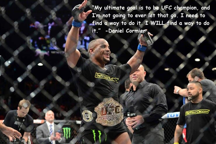 May 23, 2015; Las Vegas, NV, USA; Daniel Cormier celebrates after defeating Anthony Johnson (not pictured) in their light heavyweight championship bout during UFC 187 at MGM Grand Garden Arena. Cormier won via third round TKO. Mandatory Credit: Joe Camporeale-USA TODAY Sports