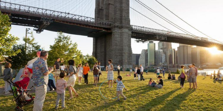 A nice lawn with skyline views at empire fulton ferry park