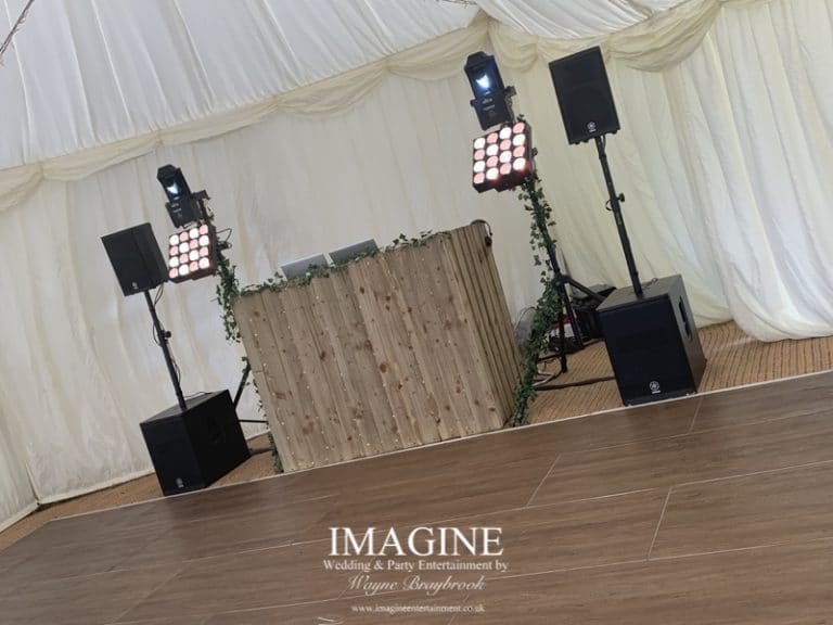 Rustic booth in a marquee setting
