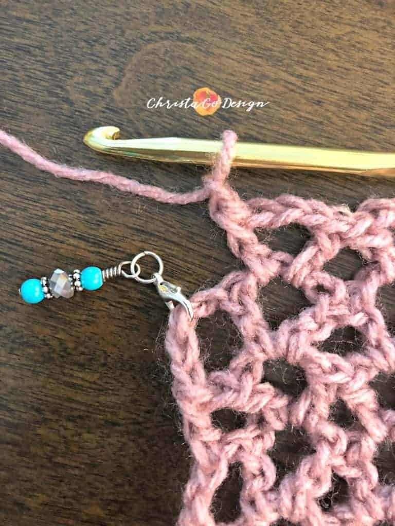 picture of ending mesh crochet row poncho in pink