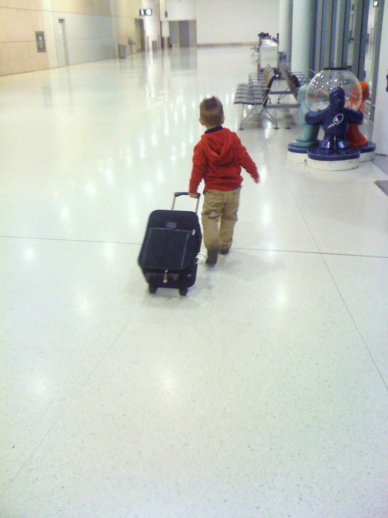 Travelin Man toddler, airport, suitcase, family travel, travel with toddler, traveling toddlers