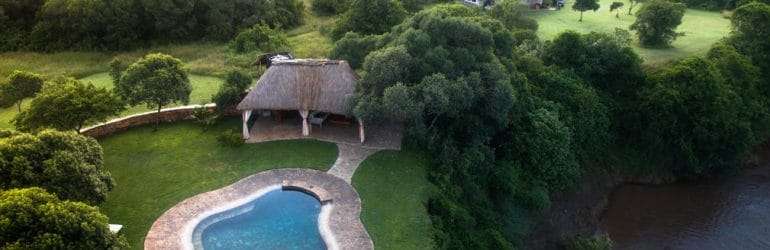 House In The Wild Aerial View