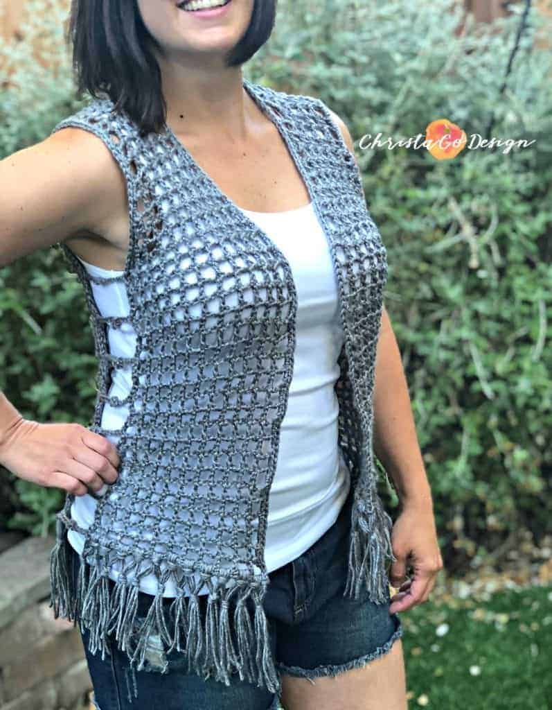 picture of woman in grey mesh vest