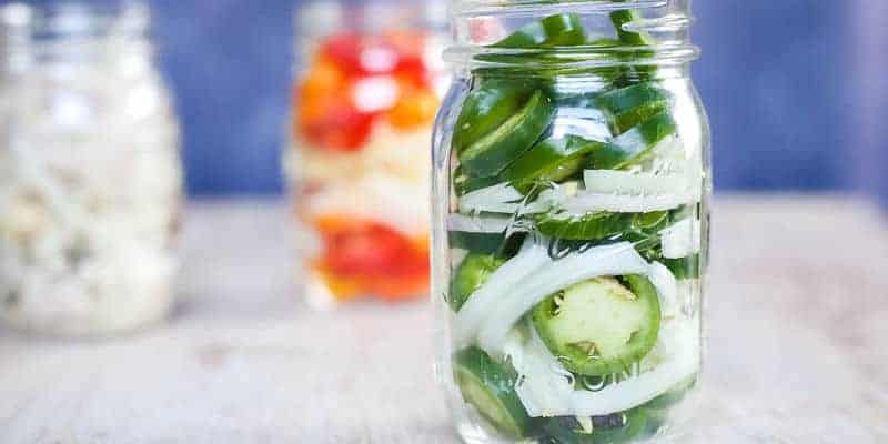 quick pickled jalapeno in a ball mason jar