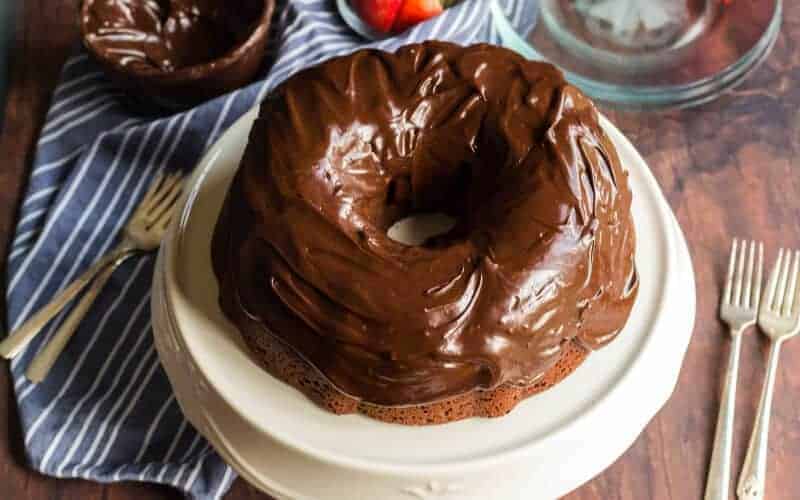 chocolate sour cream pound cake, wood, blue and white striped napkin