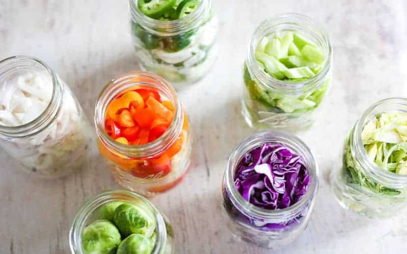 veggies shredded in mason jars ready for quick pickling