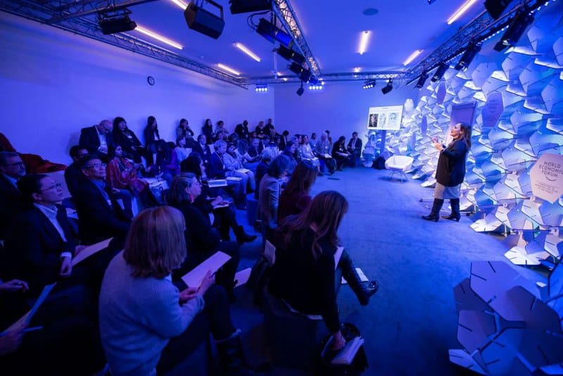 A speaker addressing an audience.