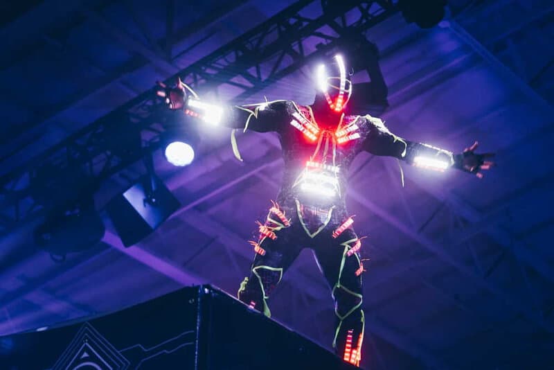 A photo of a person wearing a light suit. Photo by Eric Ward on Unsplash