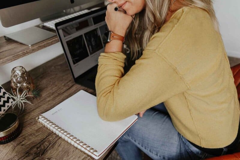 A woman working. Photo by Corinne Kutz on Unsplash