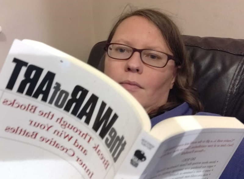 Rachel reading The War Of Art