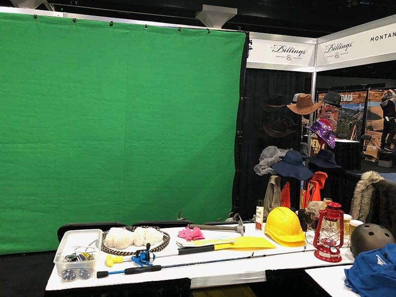Our prop display for Experiential Photo Marketing at a Travel Show event. Houston green screen photo booth at Travel and Adventure Show. This is the prop table.