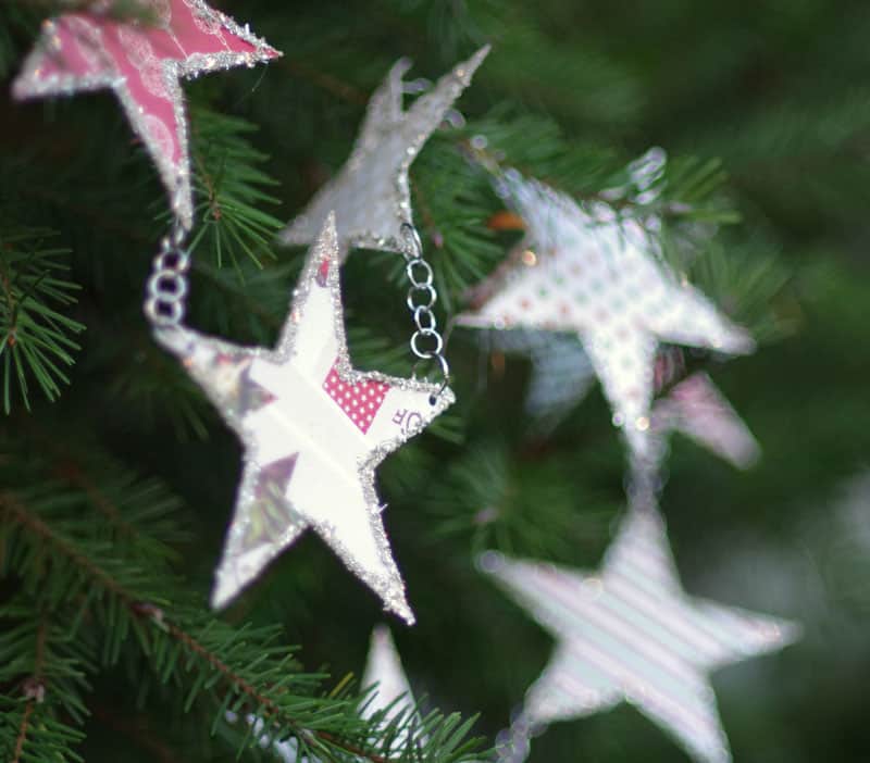stars cut out of paper and hanging from chain