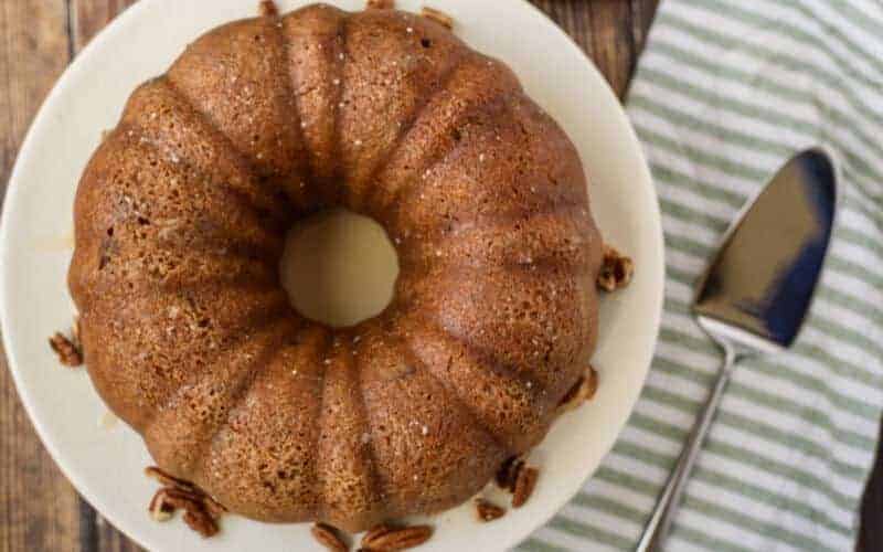 brown sugar pound cake on wooden table with striped napkin