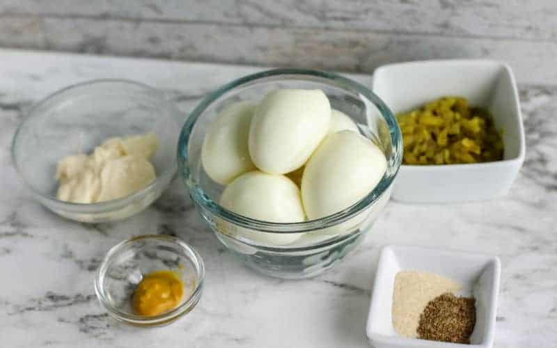 deviled egg ingredients on a table for southern deviled eggs