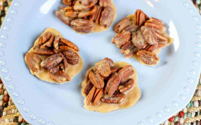 pecan praline on blue plate