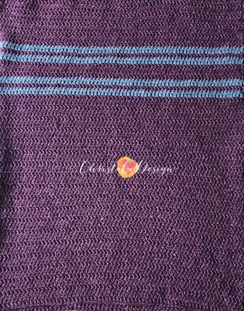 picture of men's maroon sweater with grey stripes