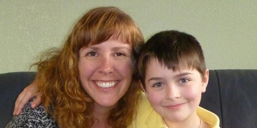 woman and boy smiling
