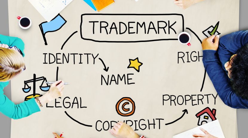Trademark Registration Solicitor Leicester - Image shows people brainstorming elements of a trade mark