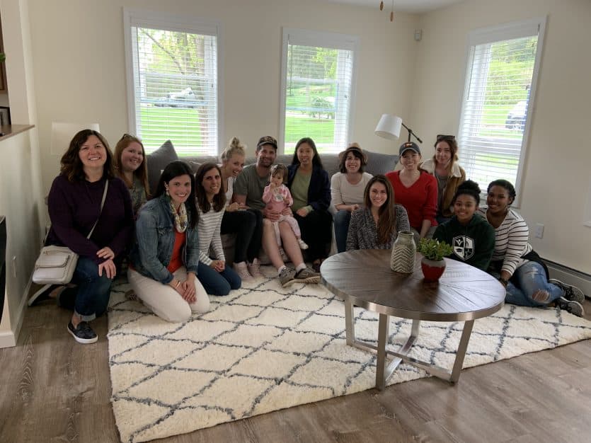 group of bloggers with the owners of a new Habitat for Humanity home