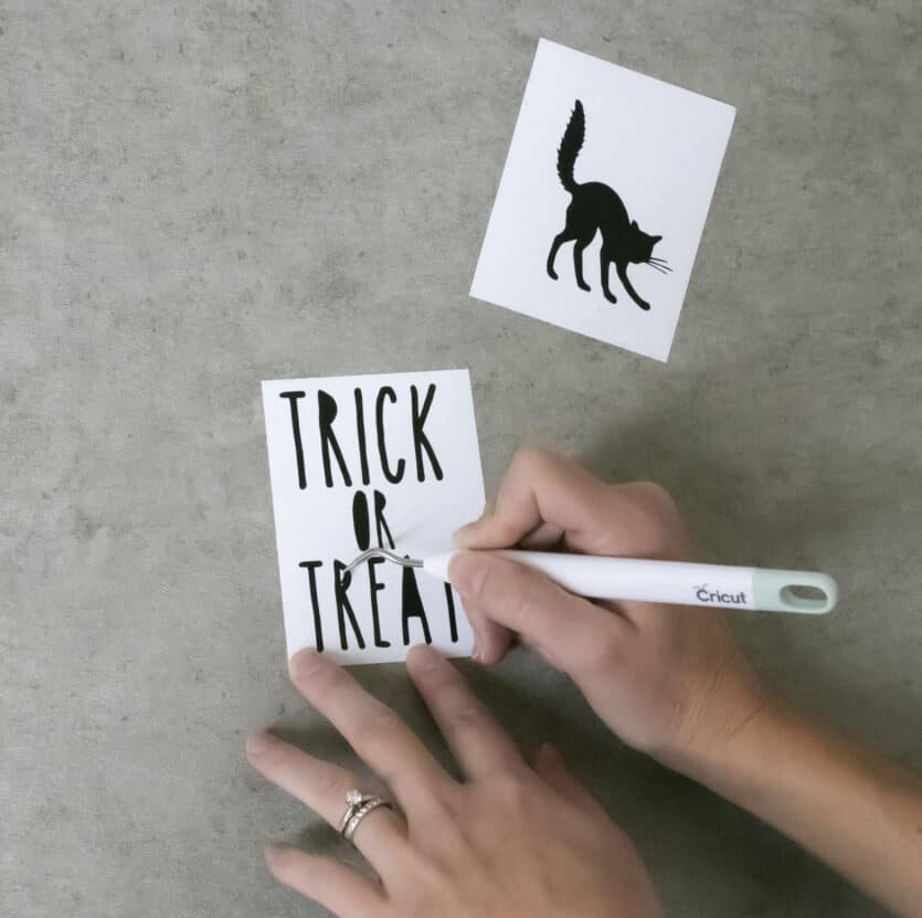 weeding Cricut adhesive vinyl