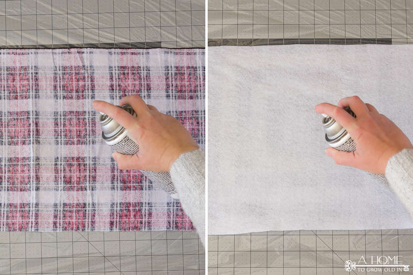 adding adhesive spray to fabric to make a Christmas banner