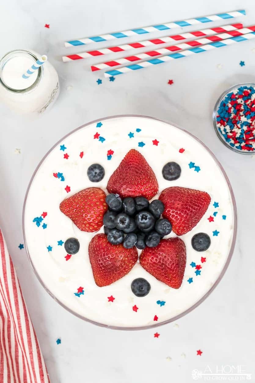 simple star decoration made with strawberries and blueberries on a patriotic trifle dessert