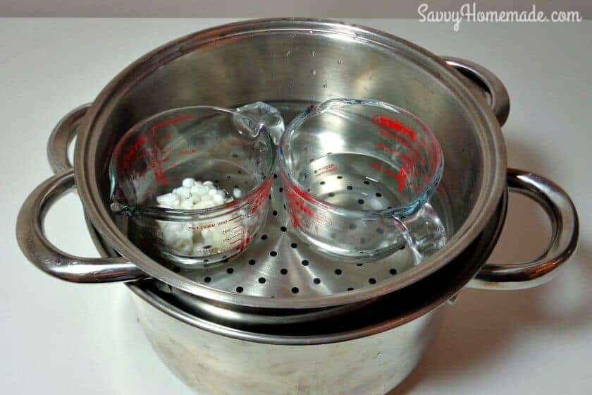Place both containers into a pan of simmering water