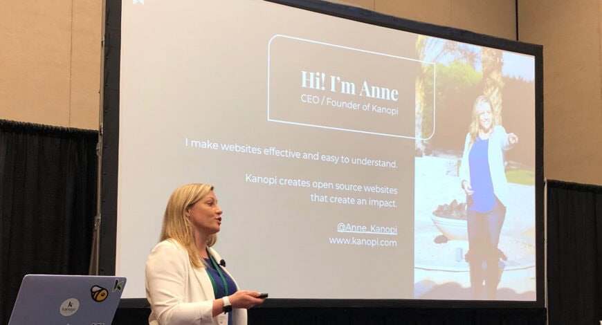Anne speaking with a presentation