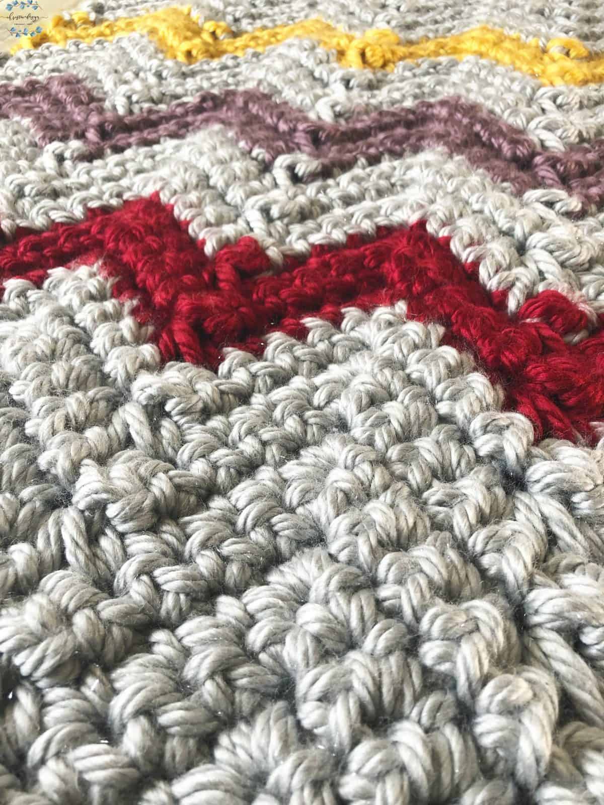 picture of chunky chevron stripes close up yellow, purple, red and silver